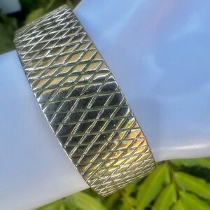 Silver tone bangle bracelet
